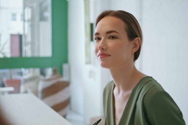 Closeup woman talking colleagues in office. Business professional counseling